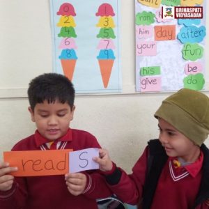 Students of Grade one learnt about simple present tense with the help of flash cards.s